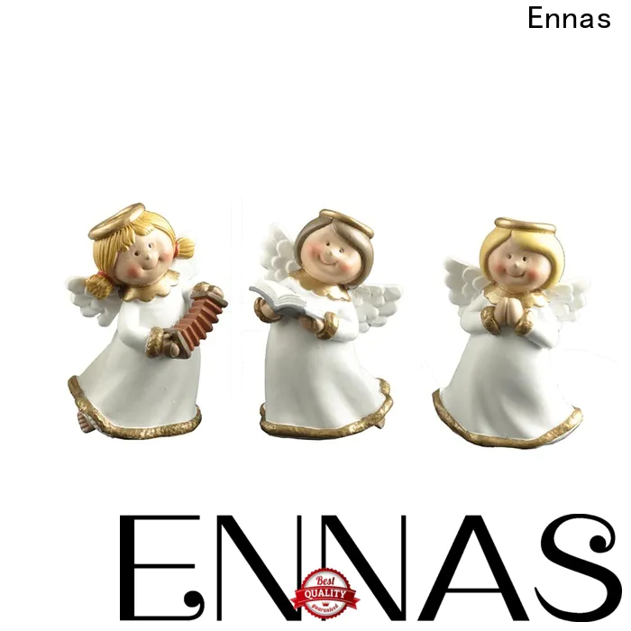 carved little angel figurines lovely at discount